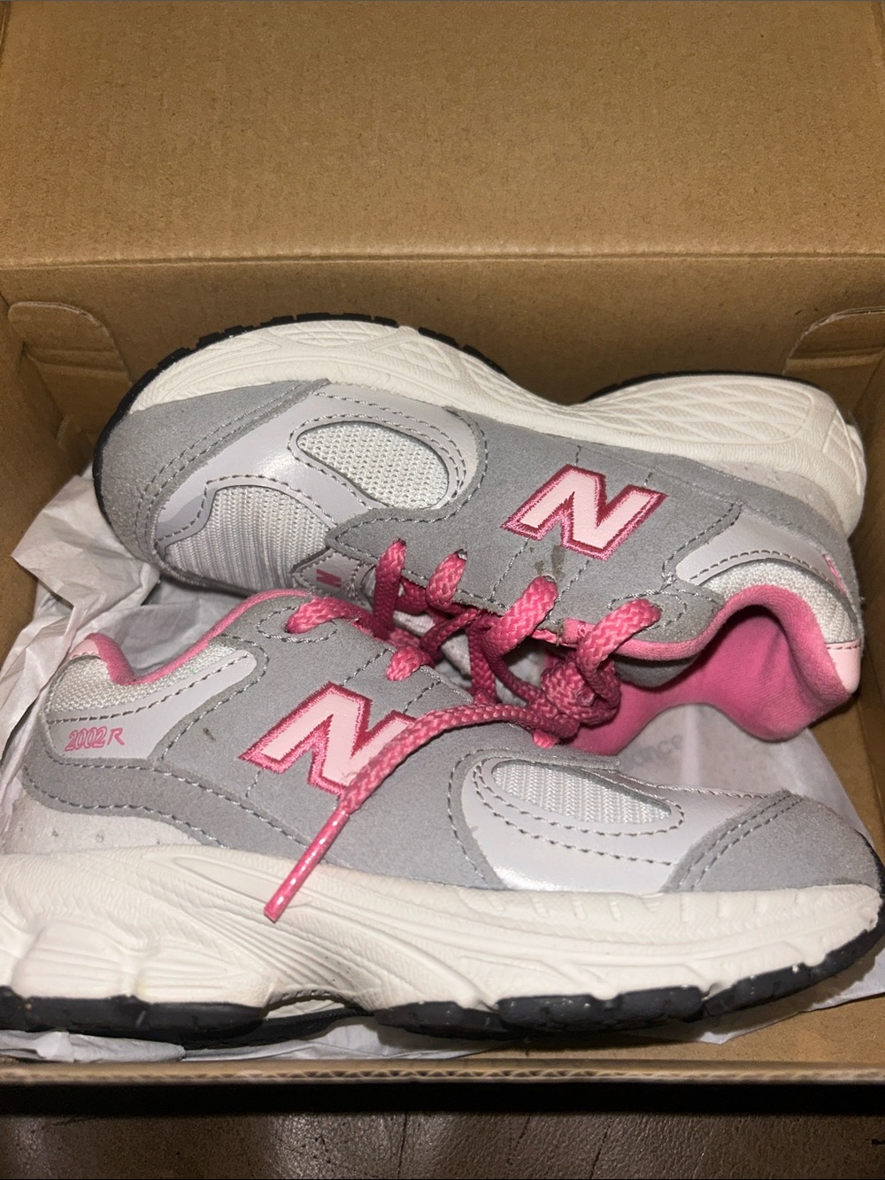 New Balance Kids Gray with Pink Accent 2002R Sneakers